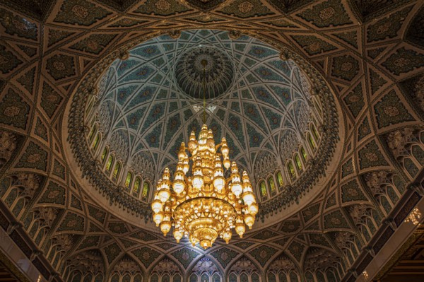 Dome and illuminated chandelier in the Sultan Qaboos Mosque, Muscat, Arabian Peninsula, Sultanate