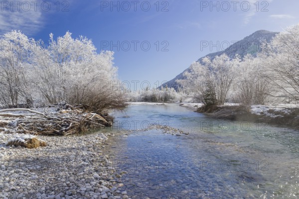 Isar valley in winter at temperatures of minus 18 degrees Celsius. Snow covered landscape with the