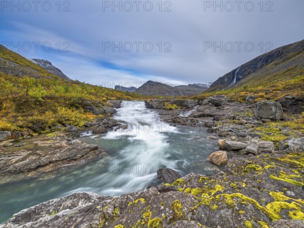 Autumn in Reinheimen National Park, mountains with river in Valldalen valley, Stigbotthornet