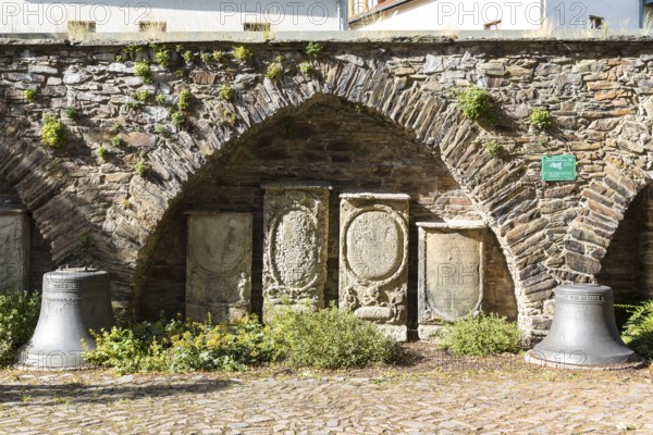 Remains of the town wall with gravestones next to the Nicolai Church, Döbeln, Saxony, Germany,
