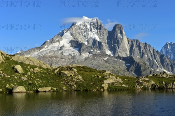 At the Lacs des Chéserys mountain lake in the Aiguilles Rouges nature reserve, view of the Aiguille