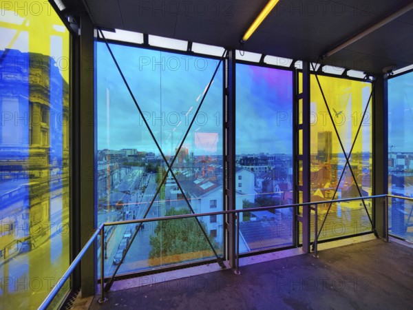 Marollescenece, art installation The Cube, coating of the windows with translucent dichroic films,
