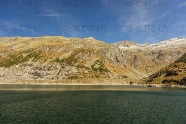 View from the Kölnbrein reservoir. The Kölnbrein Dam is an arch dam that was constructed between