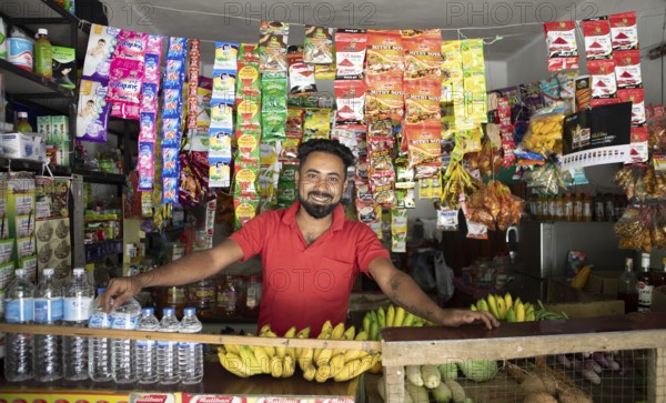 Sri Lankan man in his shop on Kandy Road, Ramboda, Nuwara Eliya, Central Province, Sri Lanka, Asia