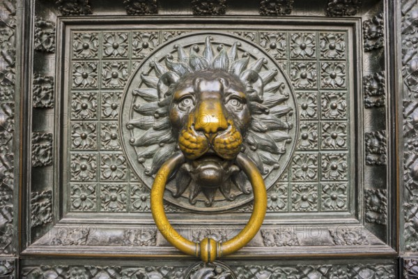 Lion's head, door knocker at the entrance portal, west façade, Cologne Cathedral, Cologne, North