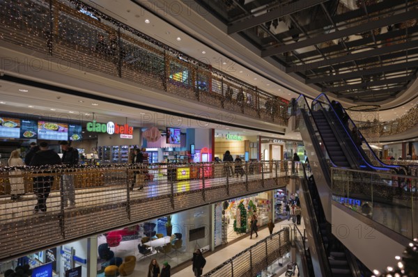 Interior shot, Königsbau-Passagen shopping arcade, escalator, decorated for Christmas, shopping
