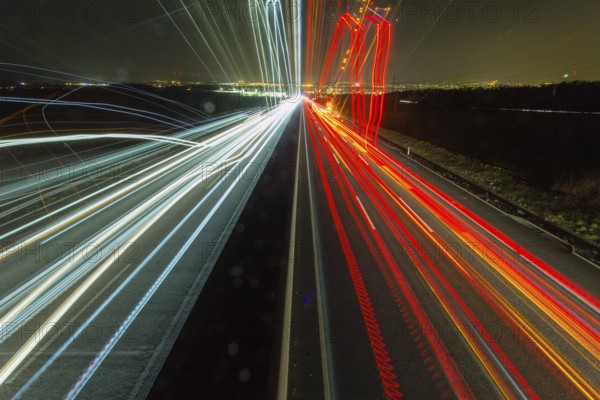 A7 Motorway, Autobahn, beside Kassel at night with light trails from the traffic headlights and