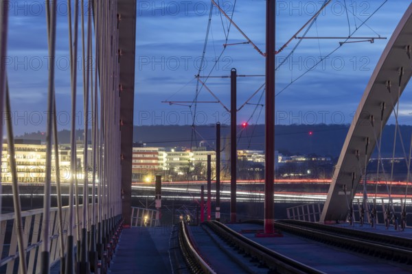 Modern light rail bridge made of carbon from Stuttgarter Straßenbahnen AG over the motorway in the
