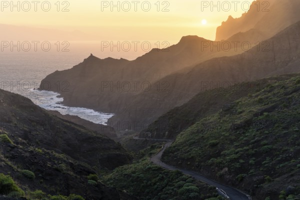 View of Punta San Lorenzo, Punta Sabina and the road to Playa de La Caleta. In the morning, golden
