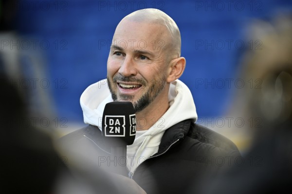 Coach Christian Ilzer TSG 1899 Hoffenheim Portrait in interview Microphone Micro Logo DAZN PreZero
