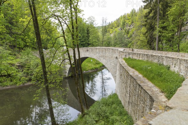 Old stone arch bridge over the Zschopau near Wolkenstein, Wolkensteiner Schweiz, Erzgebirge,
