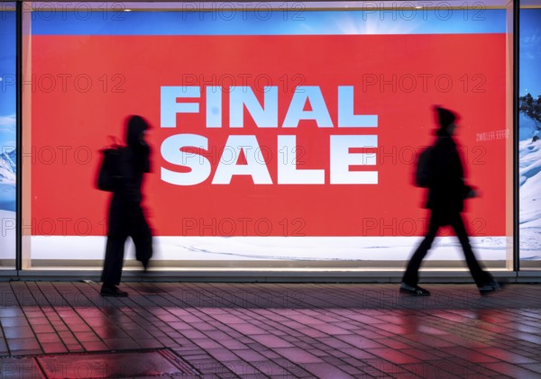 Final Sale, Clothing department stores' on Schadowstraße, large poster in the shop window