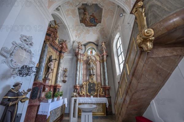 Side altar of the parish church of St. John the Baptist, built in 1475 as a Gothic church,