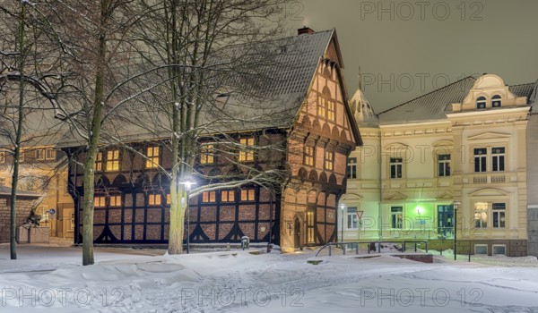 Amtspforte and Alte Polizei Winter snow illuminated Stadthagen Germany