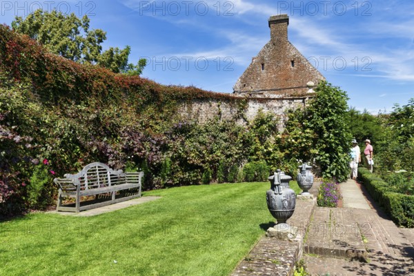 Gallery on a wall, bench, Sissinghurst Castle and Garden, Cranbrook, Kent, England, Great Britain