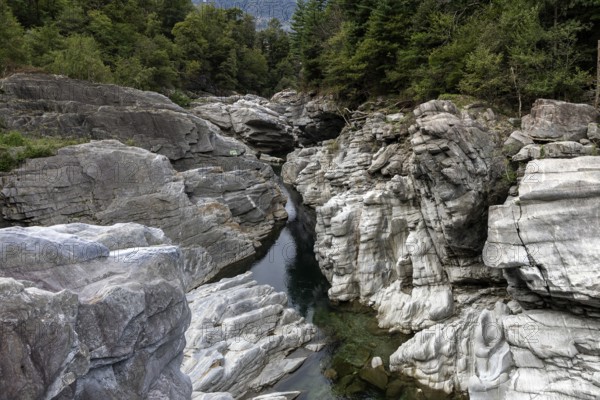 Rocks, granite rock formations in the Maggia River near Ponte Brolla, in the Maggia Valley, Valle