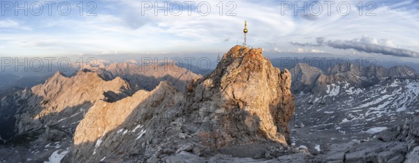 Impressive rocky mountain landscape in the evening light, summit of the Zugspitze with summit