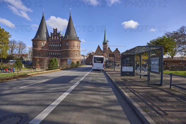 Lübeck Holstentor, bus stop Holstentorplatz with public bus, Hanseatic City of Lübeck, independent
