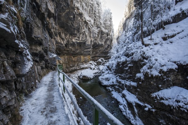 Winter, snowy landscape, river Breitach and hiking trail through the Breitachklamm gorge near
