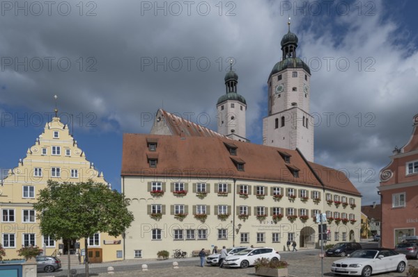Market square with historic buildings, the Krone inn, the town council and the parish church of St
