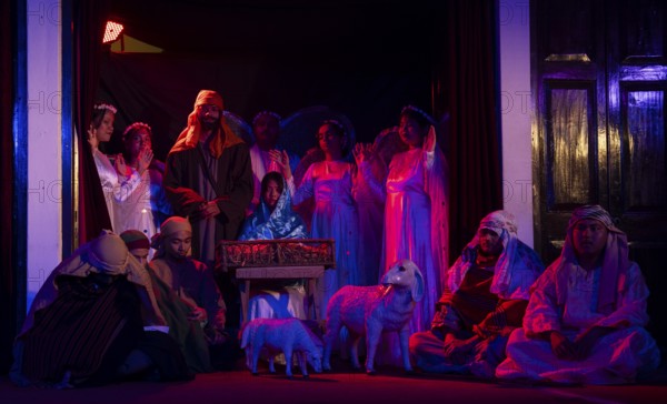 Artists perform in a nativity depicting the birth the baby Jesus on the Christmas eve, at a Church