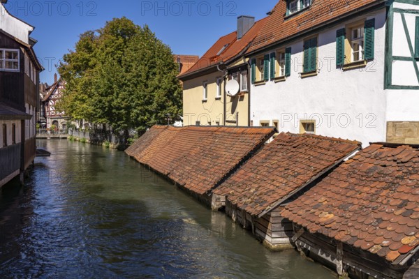 Wooden fish boxes on the Wiesent in Forchheim, Upper Franconia, Bavaria, Germany, Europe
