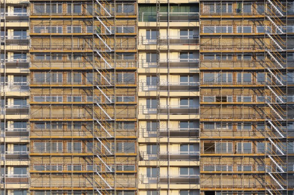Scaffolded high-rise building from the 1970s, refurbishment in the Hochheide residential park,