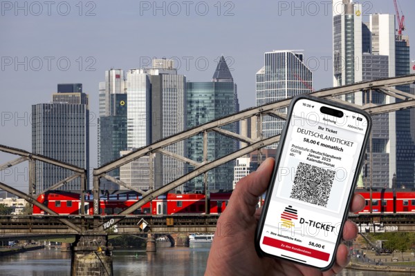 Symbolic image of Deutschlandticket, new from 2025 for 58 euros per month, ticket on mobile phone