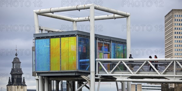 Marollescenece, art installation The Cube, coating of the windows with translucent dichroic films,