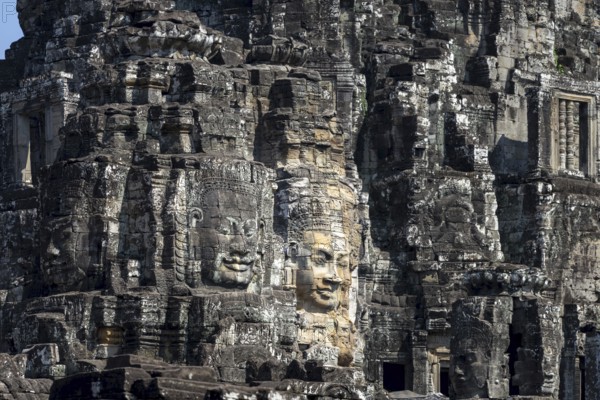 Giant stone-carved faces of the Bodhisattva Lokeshvara, also known as Avalokiteshvara, Bayon