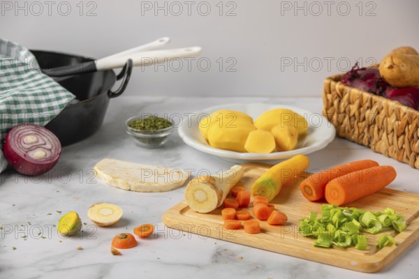 Peeled and chopped soup vegetables and potatoes, prepared for cooking