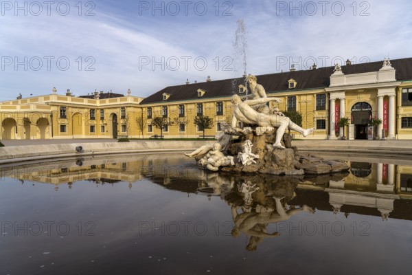 Fountain in the courtyard of honour at Schönbrunn Palace, UNESCO World Heritage Site in Vienna,