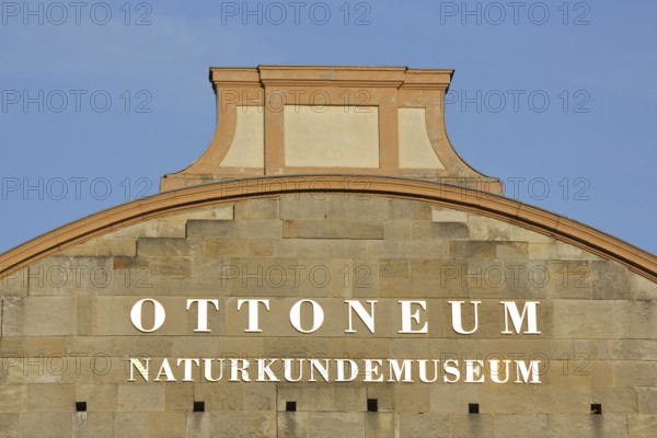 Roof with golden illuminated inscription from the baroque Ottoneum built in 1606, Museum of Natural
