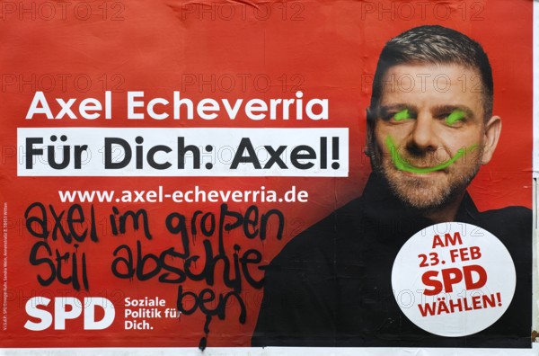 Denigration of a large poster for the 2025 federal election by the SPD with Axel Echeverria,