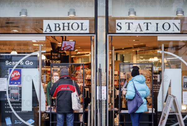 Cologne, North Rhine-Westphalia, Germany - Click and Collect in a bookshop, retail in times of the