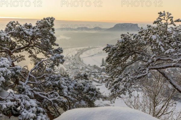Winter magic at the Bastei bridge, view of the Elbe valley shortly in front of sunrise, Saxon