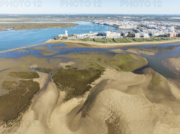The town of Isla Cristina adjacent to the Lago de la Gaviota (lake of the seagull) at low tide.