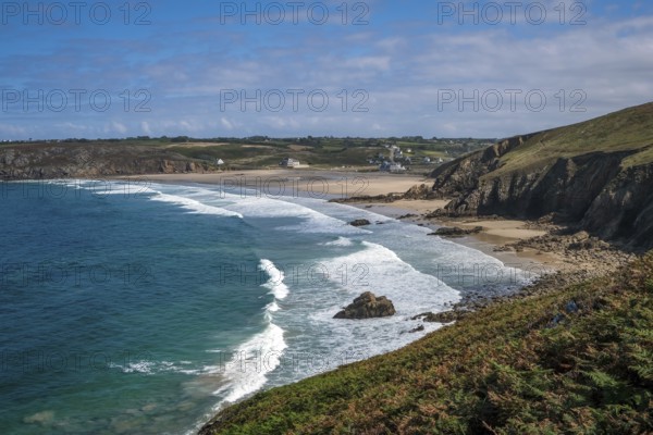Plogoff, Brittany, France - Hiking trail from Pointe du Raz to Pointe du Van, behind the bay with