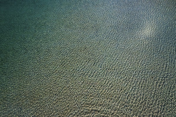 Drone shot, water surface at the beach and bay of Balos, Gramvousa peninsula, Kolimbari, West