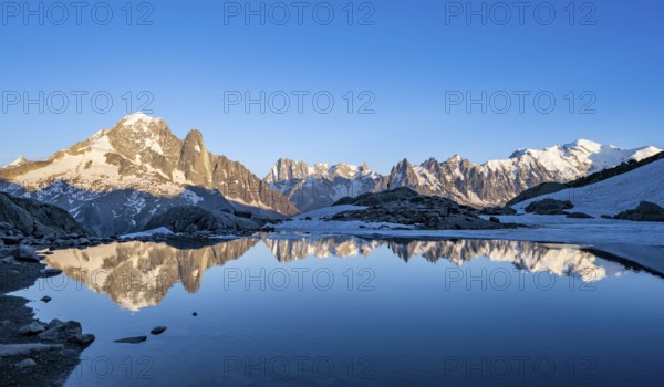Mountain landscape in the evening light, water reflection in Lac Blanc, mountain peak, Aiguille