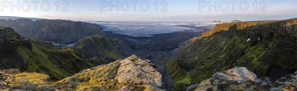 Cliffs in the evening light, Impressive landscape with mountains and glaciers, Huldujökull and
