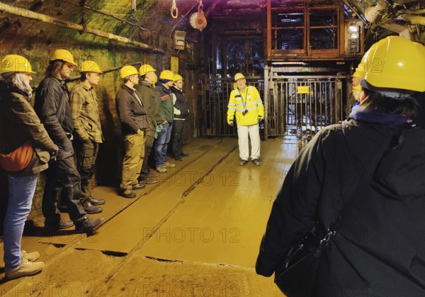 Group of visitors in front of the rope basket, Rammelsberg Ore Mine, UNESCO World Heritage Site,