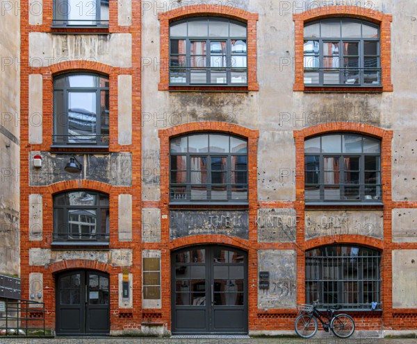 Facade of a restored factory, backyard in Berlin Mitte, Germany, Europe