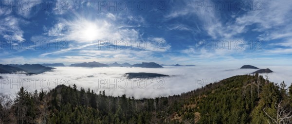 Drone shot, view from Schwarzenberg to a sea of fog in the Salzach valley, Osterhorn group,