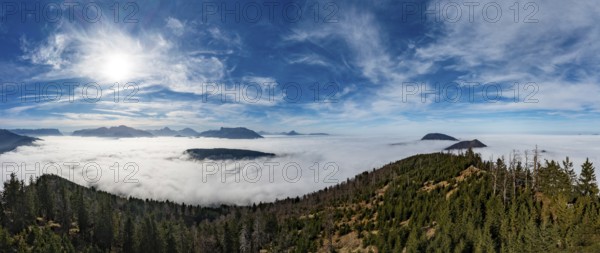 Drone shot, view from Schwarzenberg to a sea of fog in the Salzach valley, Osterhorn group,