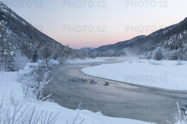 Isar valley in winter at temperatures of minus 18 degrees Celsius. Snow covered landscape with the
