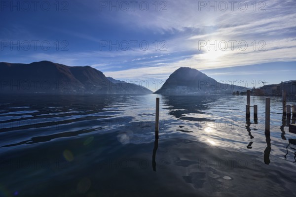 Lake, Duckdalben, mountain landscape, backlight of the sun, blue sky, veil clouds, Lake Lugano,