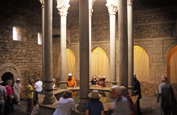 Tourists in the historic building of the Arab baths, Girona, Catalonia, Spain, Europe