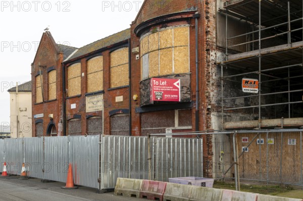 To Let estate agent sign on empty disused property in Grimsby docks, north east Lincolnshire,