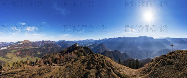 Drone shot, summit cross on the Schwarzer Berg with a view of the Lammertal with Dachstein massif